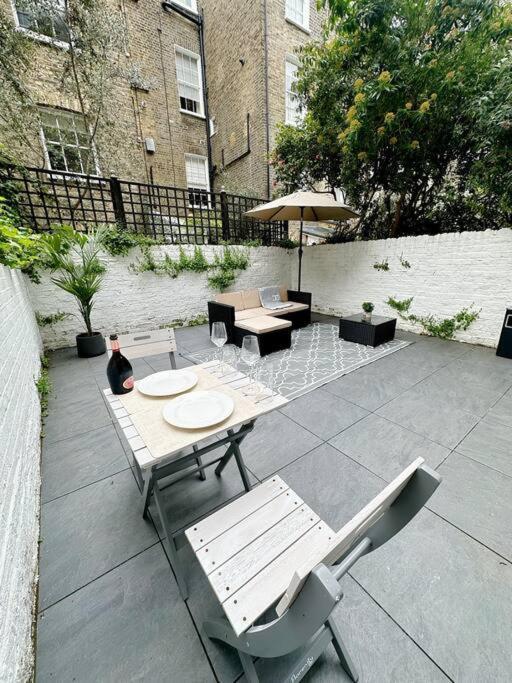 Londwell, Luxe And Leaves, Chelsea Flat With Private Garden Lejlighed London Eksteriør billede